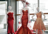 Dresses created by Luly Yang are displayed at City Hall.