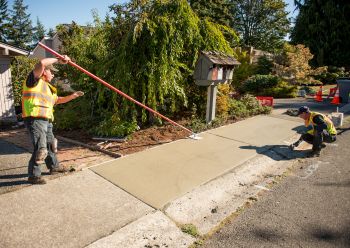 image of concrete work on sidewalk and driveway