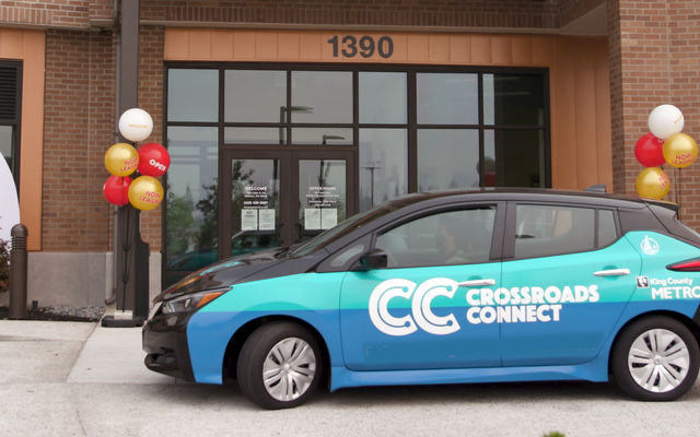 A Crossroads Connect vehicle picks up passengers.