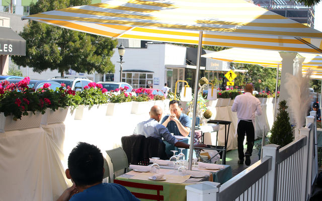 Diners enjoy the outdoor eating option at Bis on Main.