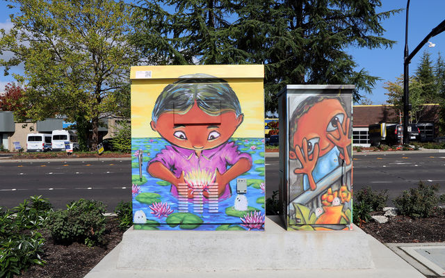 A utility box in BelRed features a wrap with art by Vikram Madan, an image called "An Utterance Ineffable."