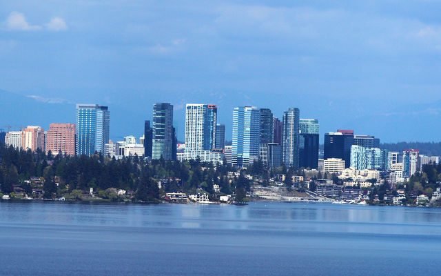 Bellevue's downtown skyline reflects on the water of Meydenbauer Bay.