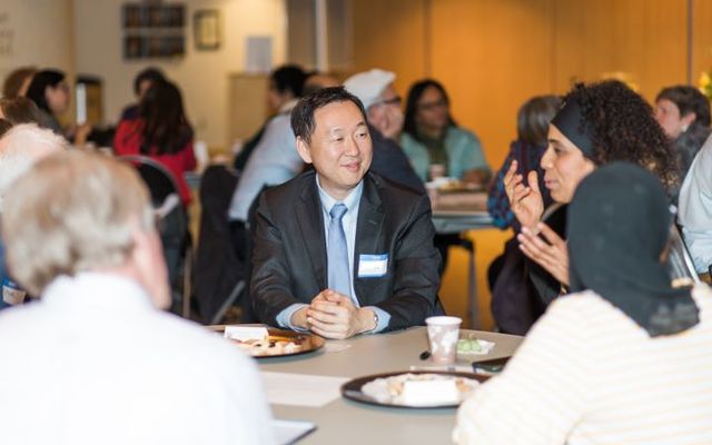 People conversing at Cultural Conversations event