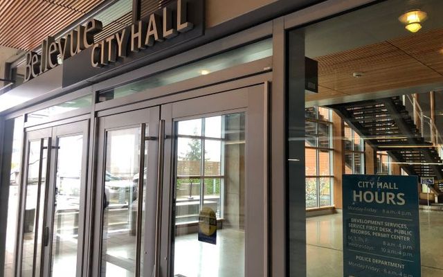 Hours sign at City Hall door