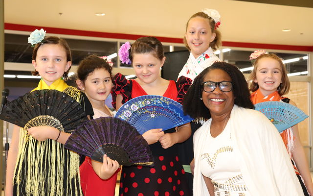 Dancers pose during a Welcoming Week event at the Factoria mall in 2019.