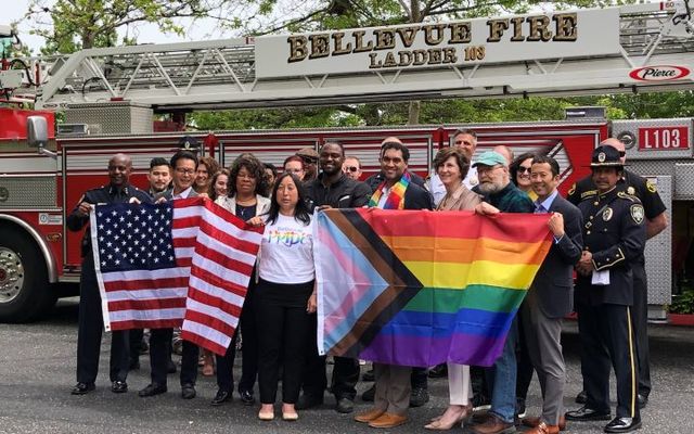 City representatives stand behind U.S. and Pride flags