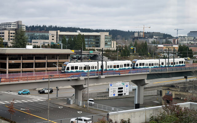 Light rail trains run along the East Link tracks as part of Sound Transit's testing.
