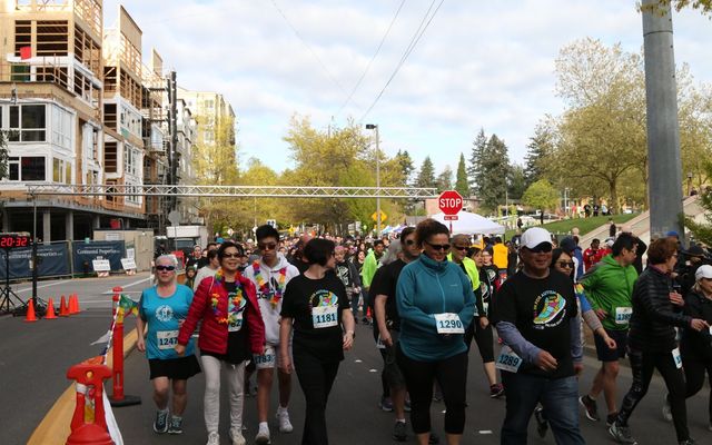 Participants run and walk in an All in for Autism race in Bellevue.