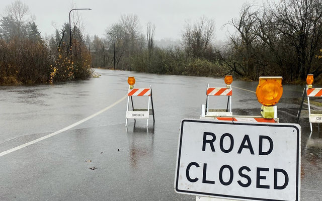 Southeast Seventh Place is submerged during a rainstorm in December 2023.
