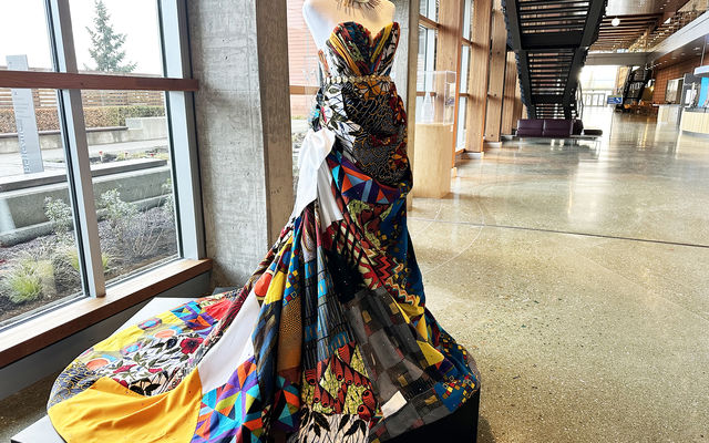 A dress on a pedestal inside Bellevue City Hall concourse.