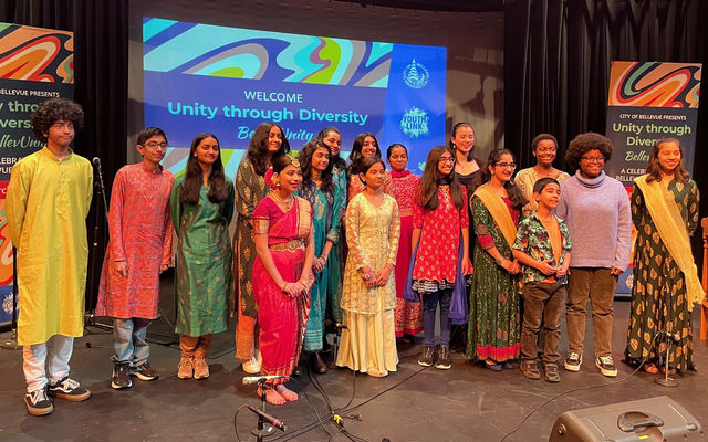 Performers take a curtain at the end of the 2023 Unity Through Diversity event.