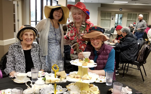 Women enjoy a tea party at the North Bellevue Community Center.