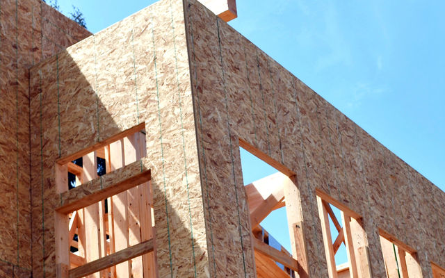 Image of residential construction on a sunny day.