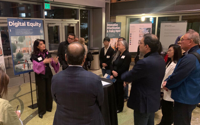 Representatives from local businesses discuss inclusive innovation at City Hall in November 2024.