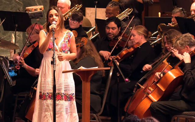 The Lake Washington Symphony Orchestra performs with a woman singing.