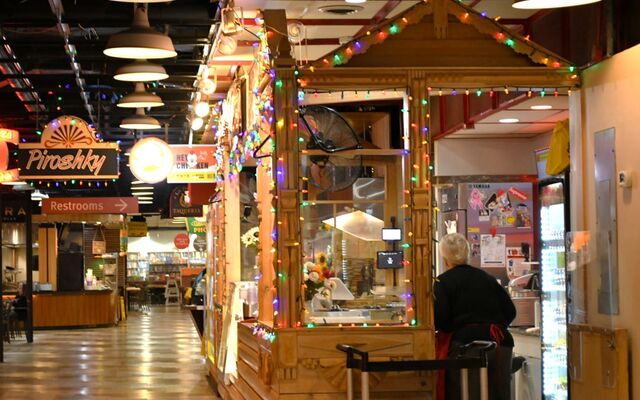 Food court at Crossroads Mall decorated in holiday lights