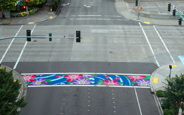 One of the crosswalks at 106th Avenue Northeast and Northeast 10th Street has been painted an artistic design.