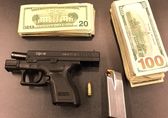 Confiscated gun and cash