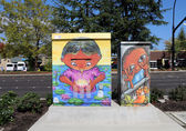 A utility box in BelRed features a wrap with art by Vikram Madan, an image called "An Utterance Ineffable."
