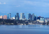 Bellevue's downtown skyline reflects on the water of Meydenbauer Bay.