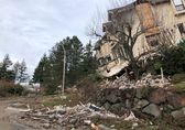 Home impacted by landslide