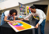 Artist Neha Panicker creates works at Bellevue's Bellwether event. Photo by Nate Gowdy