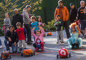 Children experience joy and agony at start of a Halloween on the Hill pumpkin race.