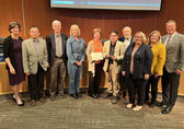 The City Council and Transportation staff accept a Smart Communities mobility award.