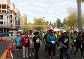 Participants run and walk in an All in for Autism race in Bellevue.