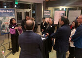 Representatives from local businesses discuss inclusive innovation at City Hall in November 2024.