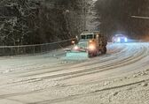 Snowplows clear snow from Bellevue streets.