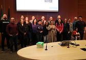 The first Startup 425 Accelerator cohort to graduate poses at City Hall, in the council chamber.