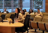 Claire Sumadiwirya answers questions from the council.