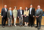 The City Council poses in the council chamber with new member Claire Sumadiwirya