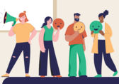 Four people stand in a row in playful poses.