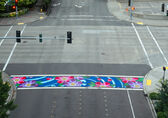 One of the crosswalks at 106th Avenue Northeast and Northeast 10th Street has been painted an artistic design.