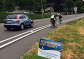 cyclists-levy-sign.jpg cyclists-levy-sign.jpg