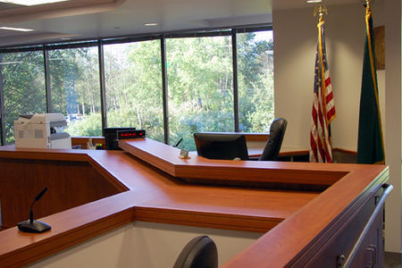 inside of the courthouse, seating are and windows
