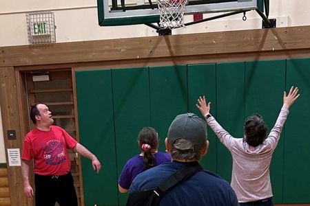 Image of group playing basketball at Highland Community Center