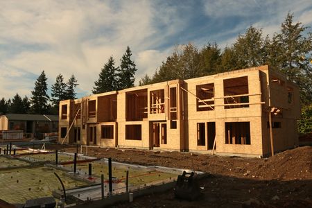 Residential wood frame, empty shell, middle of construction process. 