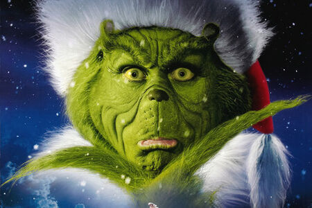 How the Grinch Stole Christmas movie poster showing the Grinch staring at camera with the classic 'thinking' gesture, fingers under the chin, and eyes slightly narrowed