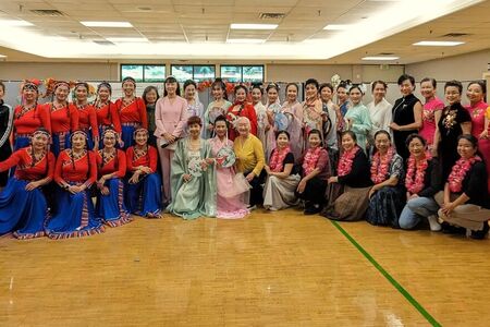 Chinese dancers pose for a group photo