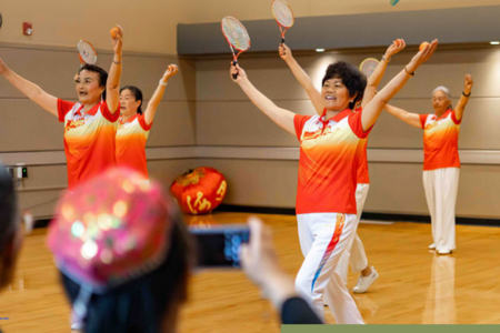 Activity Guide cover shows performers at Crossroads Community Center