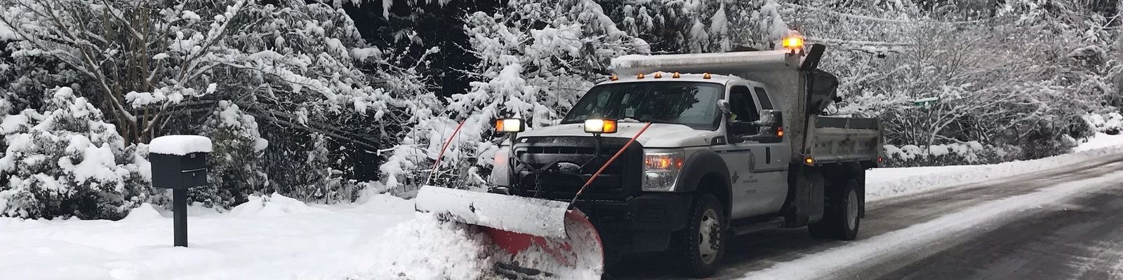 snow plow clearing road