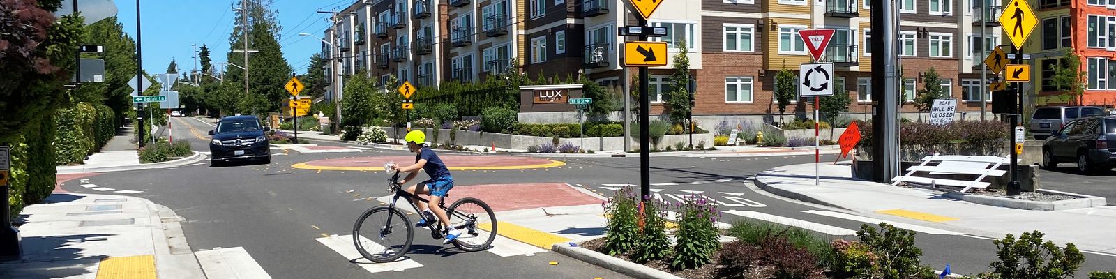 Image of bicyclist in roundabout crosswalk