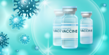 Image of coronavirus with vaccine bottles in the foreground
