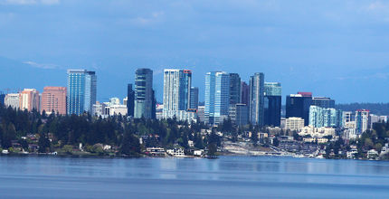 Bellevue's downtown skyline reflects on the water of Meydenbauer Bay.