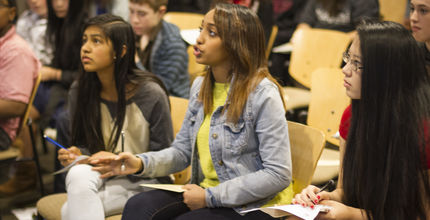 A girl speaks at a Youth Involvement Conference hosted by Bellevue Youth Link. Michael Kleven Photography