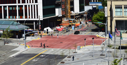 The raised intersection at Northeast Sixth Street can be seen from afar because the pavement is colored.