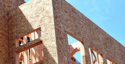 Image of residential construction on a sunny day.